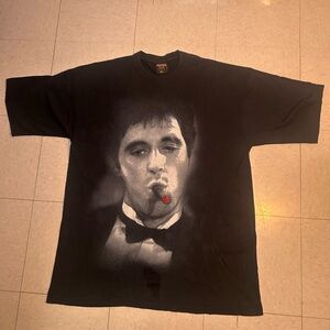 Champs Black Graphic Tee with Portrait and Red Accent